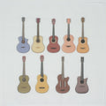 Cotton Handkerchief Illustrations of various guitars in different colors on a white background