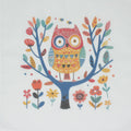 Cotton handkerchief. A colorful folk-art style illustration of an owl perched on a tree branch with flowers around it, printed on a white square background.